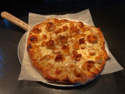 This pizza may seem scary to try but I PROMISE, you won’t be disappointed!!We use our Sugar Pearl Waffles, a syrupy butter base, fried chicken, our cheese blend and sprinkle it all with cinnamon, sugar and maple! 

We have it for one more week, so don’t sleep on it much longer! 

Cheers! 🧇🍕